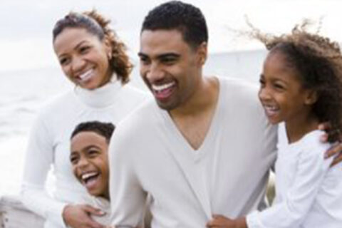 happy family along the beach